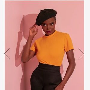 Vixen by Micheline Pitt girl gang short sleeve top in mustard large NWT